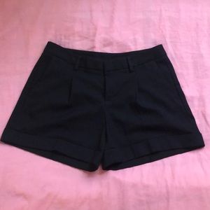 Uniqlo black roll-up shorts